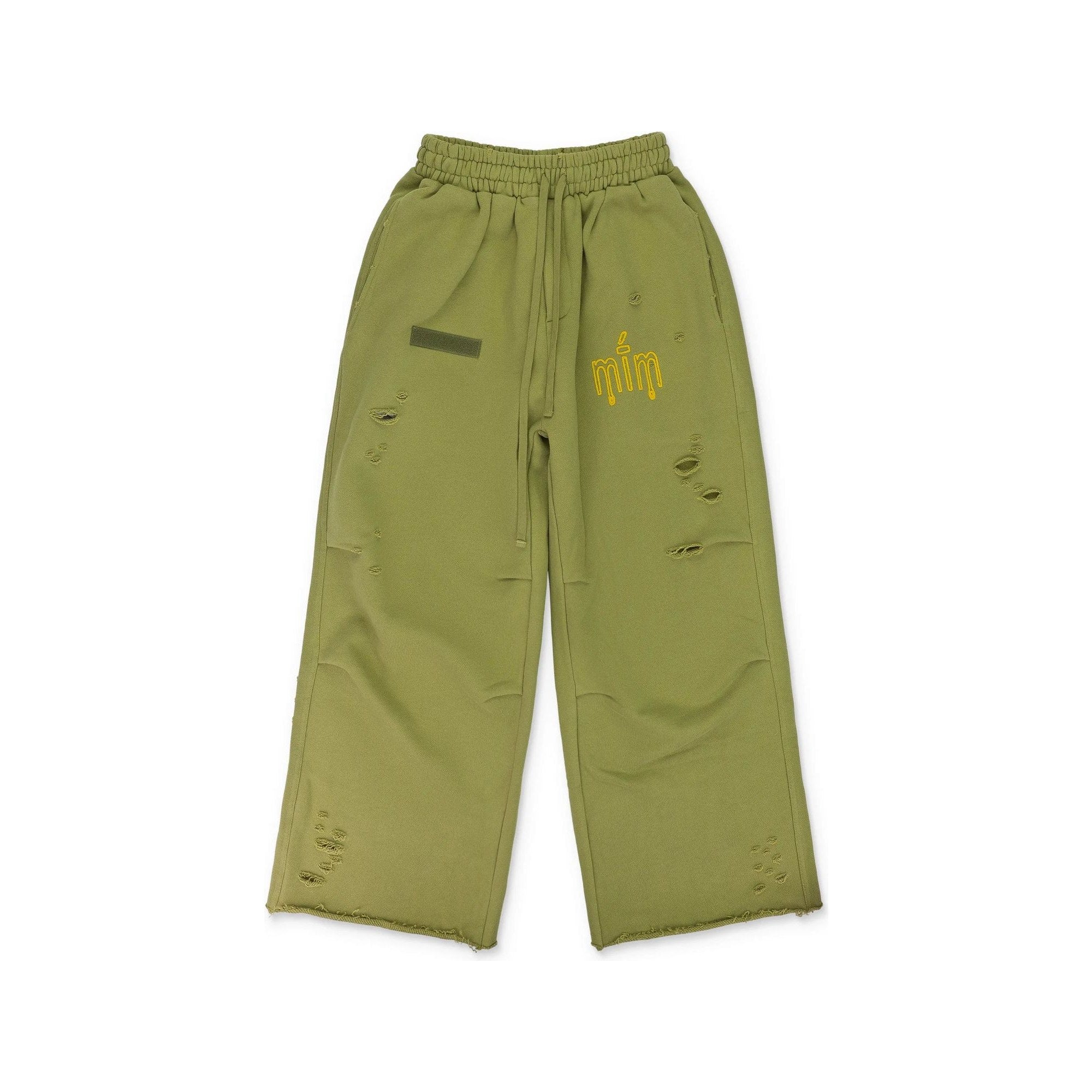 MURD333R.FM General Issue: Special Ops Sweatpants in sage green with a yellow logo.